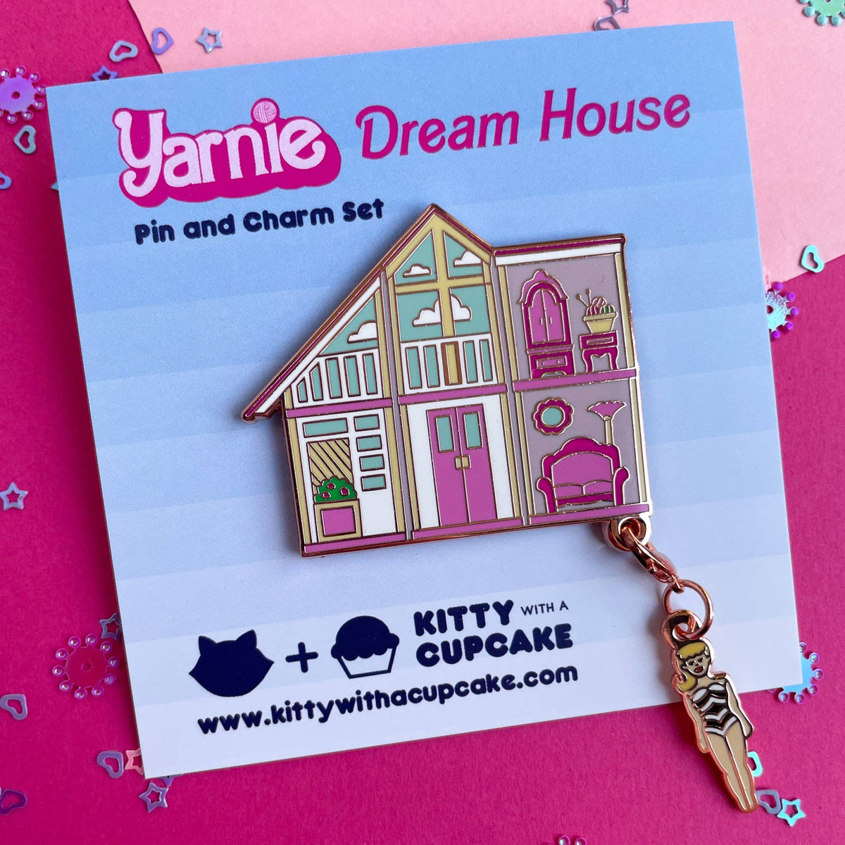 Yarnie Dream House pin and charm set on a branded card with decorative elements.