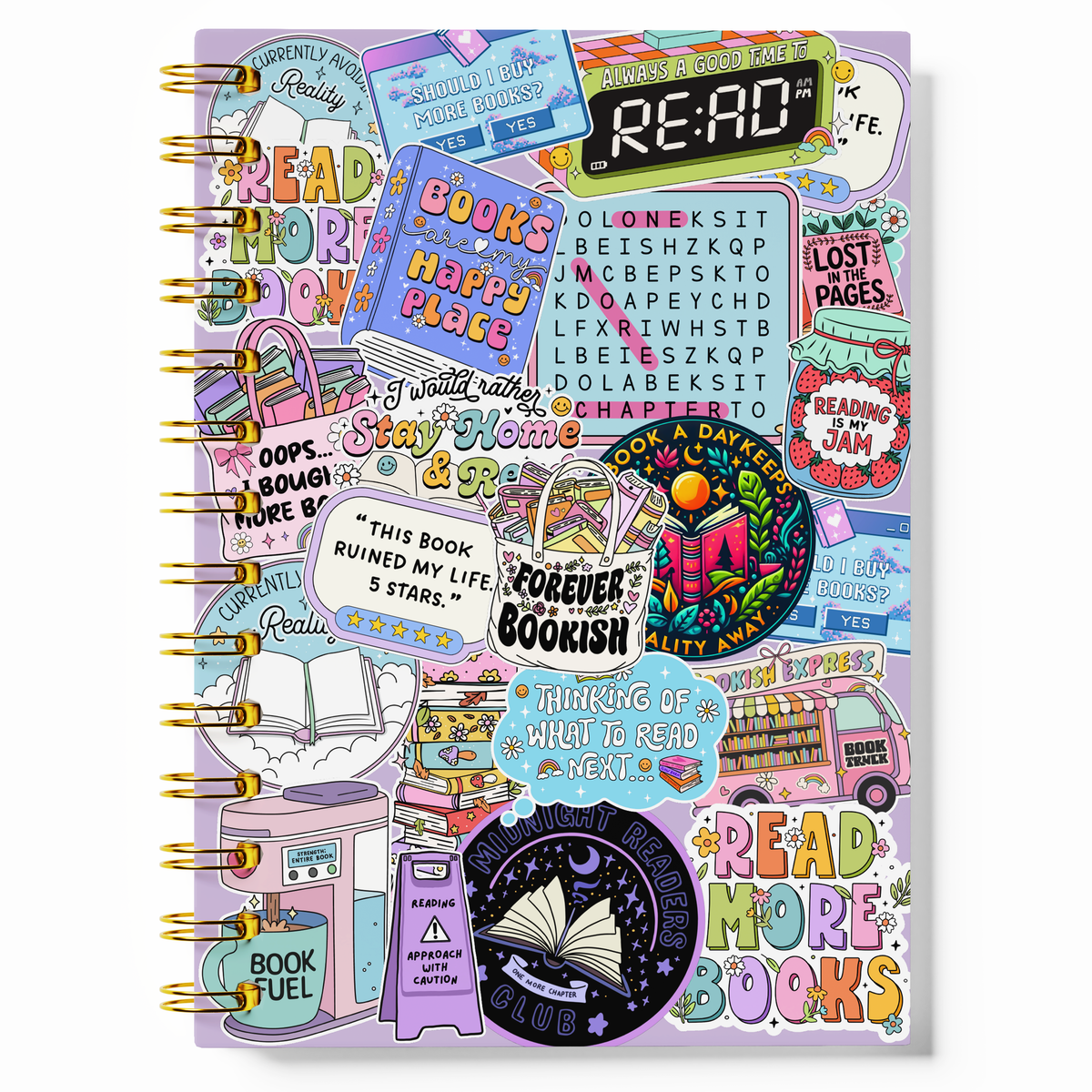 A spiral-bound notebook with a lavender cover covered in colorful book-themed stickers and illustrations, including a large 'READ' clock graphic and phrases like 'Books happy flags' and 'Read more books.'.