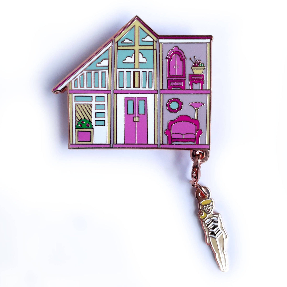 Colorful house-shaped keychain with interior details and a keychain attached on a white background